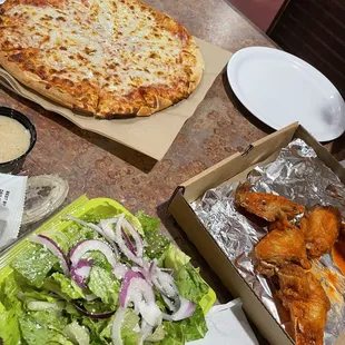 Med cheese, wings, Caesar salad. Ask for extra Buffalo sauce