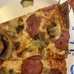 Ham, mushroom and artichoke on thin crust.