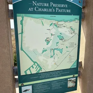 Sign along paved walkway