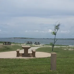 Several picnic tables are strategically placed next to the channel between Port Aransas in Aransas Pass.