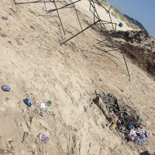 Trash including lots of broken glass on July 6, 2014