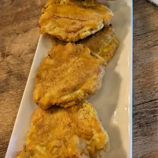 ows fried fish with a side of coleslaw