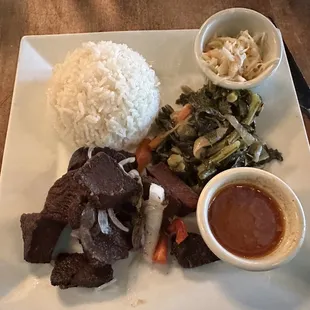 Beef, collard greens which white rice and black bean soup (not pictured)