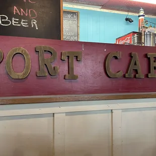 the sign for port cafe