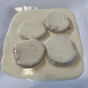 Packaged gravy and some sort of hockey puck biscuits