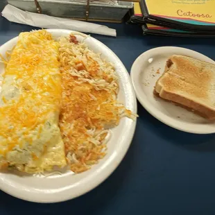 an omelet with toast and a sandwich