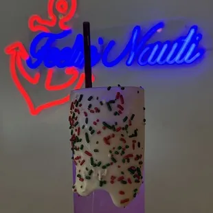 a purple drink with sprinkles