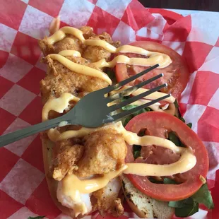 Po boy sandwich no bigger than my fork.