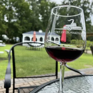 a glass of wine on a table