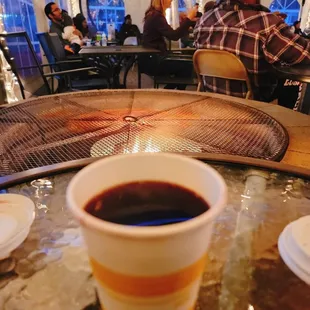 a cup of coffee on a table