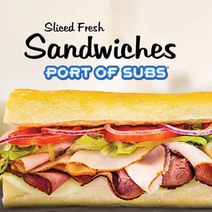 a sandwich with meat, cheese, and lettuce