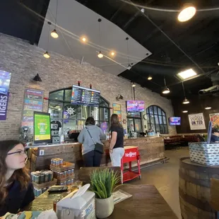 a woman sitting at a table