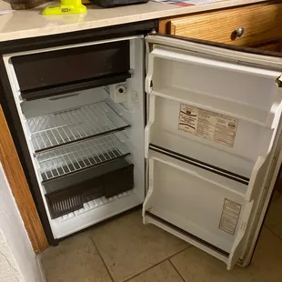Mini fridge at wet bar doesn&apos;t work and stinks like mildew
