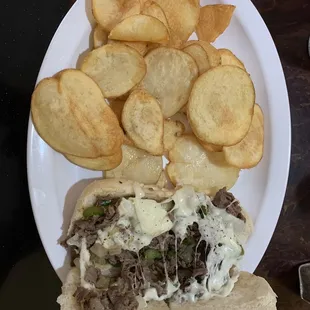Cheesesteak lunch special with homemade chips and drink for $6.99