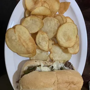 Lunch special. Cheese steak with onions and green peppers comes with mushrooms. Homemade potato chips. Get a drink included.