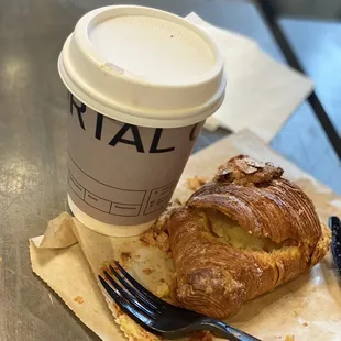 Rose latte with oat milk and almond croissant. I managed to capture a pic before I ate it all.... Lol