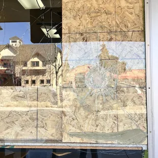 1 of 3 broken glass windows