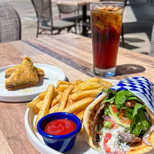 Gyro Pita with French fries. Baklava