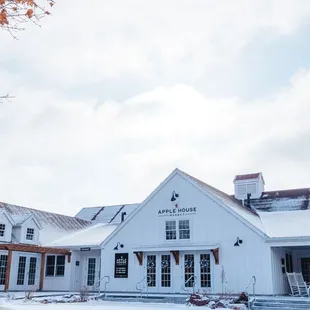 a large white house with a covered porch