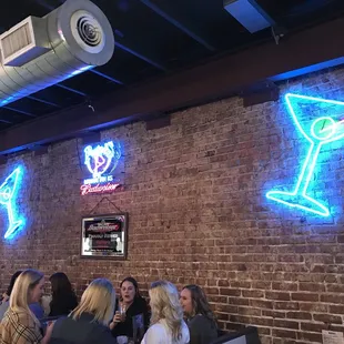 people sitting at the bar