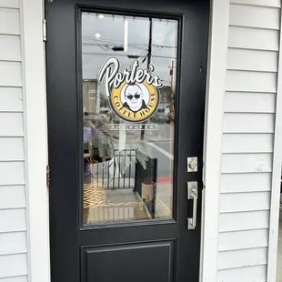 Front entrance is on the side near side walk