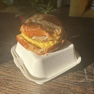 Fresh croissant with sausage, egg and cheese.  Yum