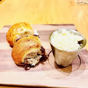 a sandwich with a side of mashed potatoes