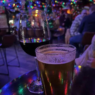 two glasses of beer on a table