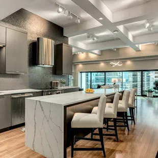 a modern kitchen with a large island