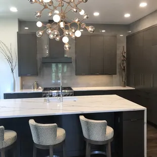 a modern kitchen with a large island