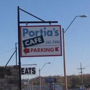 a sign for portia's cafe