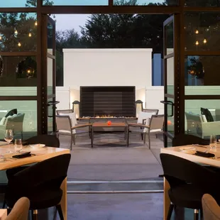 a view of a patio from the dining room