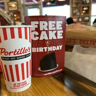a cup of coffee and a book on a table