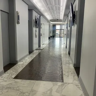 Take the elevator to ground level.