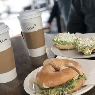 a bagel, sandwich and coffee