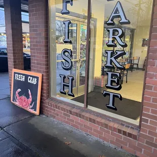 Outside on the side of the building.