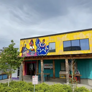 The Portland Mercado main building from the small free parking lot