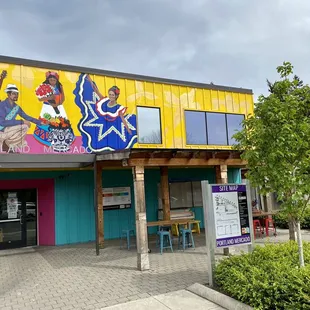 The main Portland Mercado building entrance with Site Map