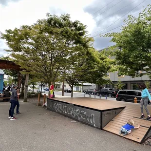 Little play area for, use it with caution since the intersection is super busy and street is right on the other side.