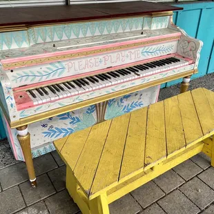 Piano near the entrance of Portland Mercado with a simple request of "Please Play Me"