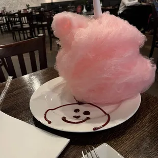 In house cotton candy, freshly made and brought to your table when your server brings the check.