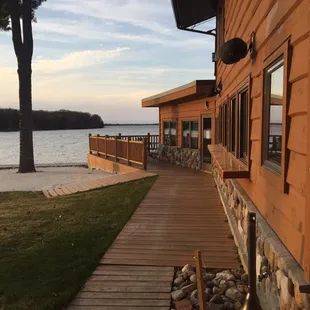 a wooden walkway leading to a beach