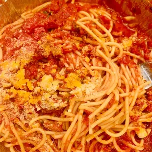 a bowl of spaghetti and sauce