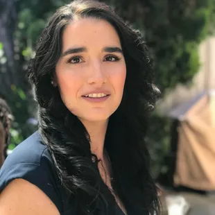 a woman with long black hair