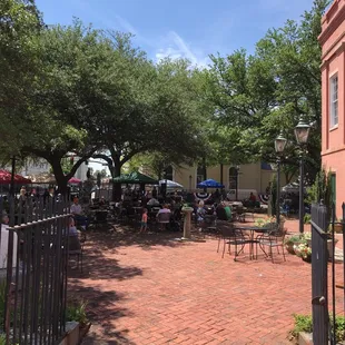 Live music in the arts center courtyard behind the Farmers Market