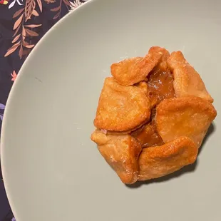 Apple caramel mini ~3$ sweet and gooey. Small but more than enough to share a bite or two