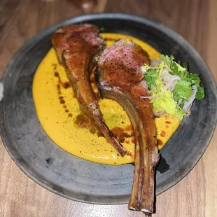 Lamb chop with carrot puree, black lime jus, cilantro. Extremely flavorful and perfectly cooked 9/10