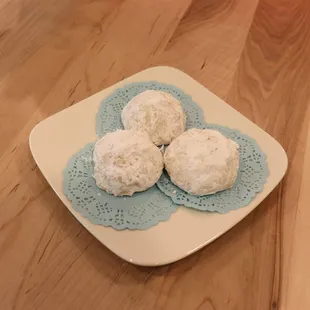 Try our Mexican wedding cookies with a cup of our bold coffee.