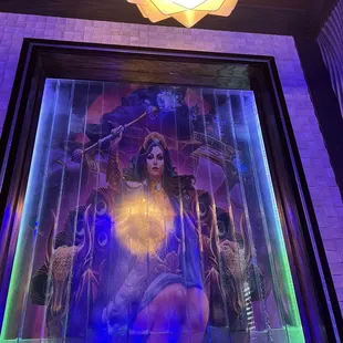 Hera is at the first booth to the right upon entering