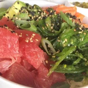Delicious poke bowl. Huge portion and super fresh tuna and salmon.